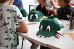 W trakcie warsztatów uczestnicy zaprojektują i wykonają czapeczki dinozaurów (fot. mat. Muzeum Górnośląskie)